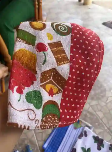 Foto de cliente com pano de prato entregue